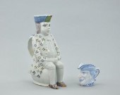Two Faience Figural Pitchers The first