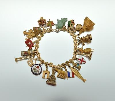 A French Gold Bracelet With Charms  b4eb8