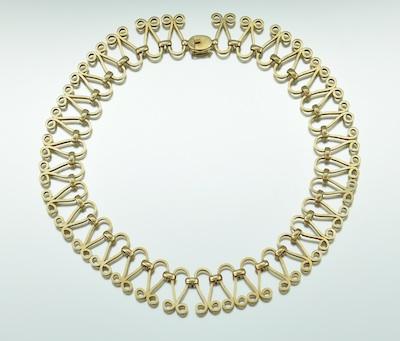An Elegant Yellow Gold Necklace b4f0f