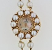 A Ladies Pearl and Gold Lucien Piccard