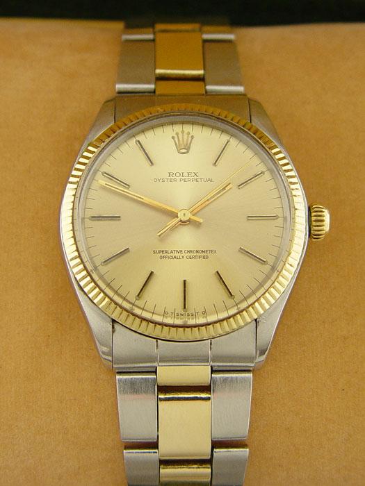 ROLEX 14K OYSTER PERPETUAL WRISTWATCH: Two