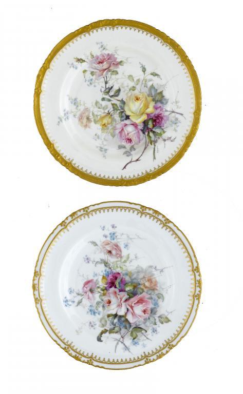 A ROYAL CROWN DERBY PLATE
of Brighton shape,
