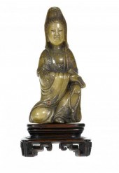 A CHINESE CARVED STONE FIGURE OF GUANYIN