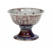 A RUSKIN HIGH FIRED STEM CUP
the speckled