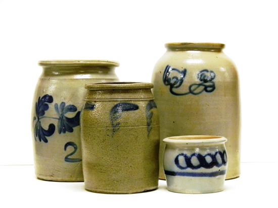 Four stoneware crocks including: one two