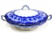 Flow blue covered dish  footed with