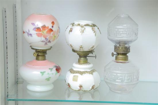 THREE MINIATURE GLASS LAMPS WITH 10ad0c