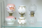 THREE MINIATURE GLASS LAMPS WITH SHADES.