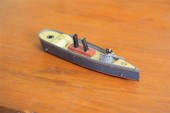 TIN WIND-UP BOAT. A small ship with