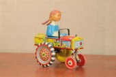 TIN WIND UP TOY. A Marx crazy car with