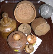 Seven round wooden cup type mold butter