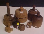 Eight round wooden cup type mold butter