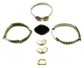 Jewelry: black diamond-shaped pin with