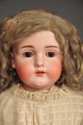 German Bisque Child Doll. 
Description