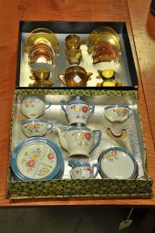 TWO TOY TEA SETS. The Little American