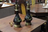 PAIR OF LAMPS. Black glazed lamps with