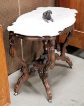 VICTORIAN MARBLE TOP DOG TABLE.  Probably