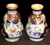 Two English porcelain vases  both flow