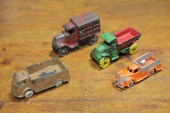 FOUR TOY TRUCKS American early 122d56