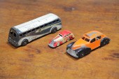 THREE TOY AUTOMOBILES.  American  first