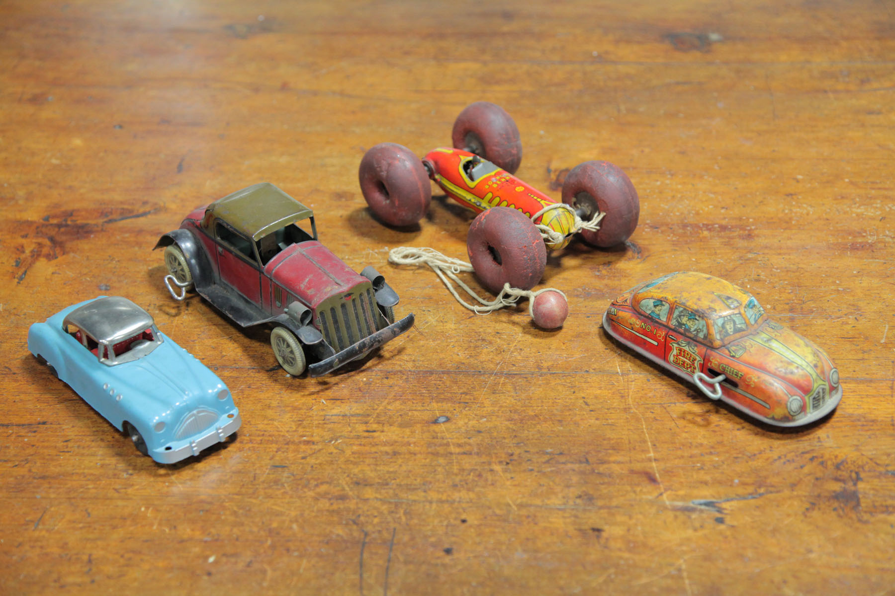 FOUR TOY CARS American second 122d66
