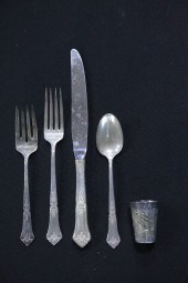 SET OF STERLING SILVER FLATWARE. State