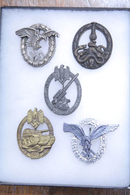 FIVE NAZI BADGES. Two similar observers badges.