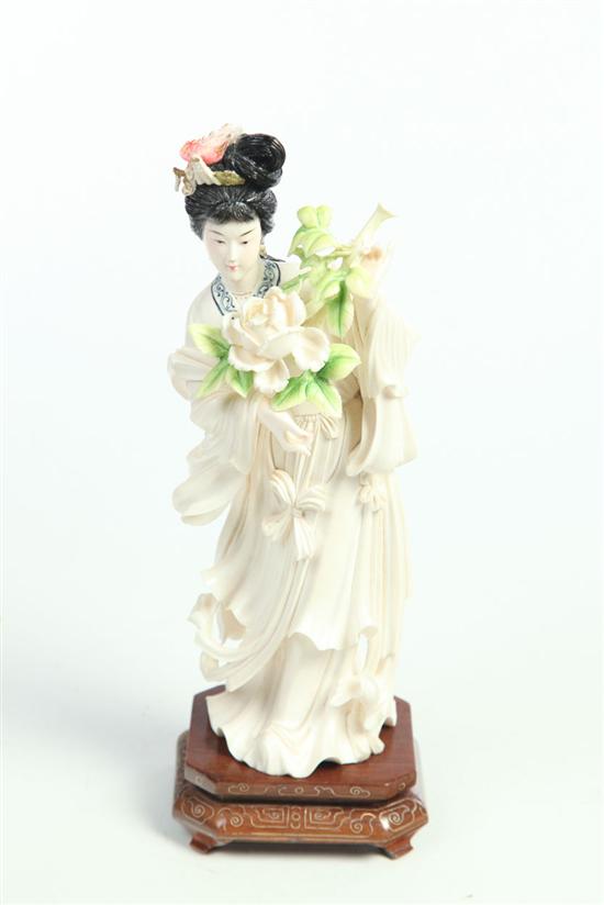  CARVED IVORY FIGURE OF A WOMAN  123552