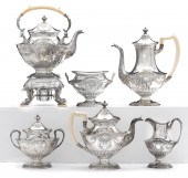 A sterling and ivory six piece tea and