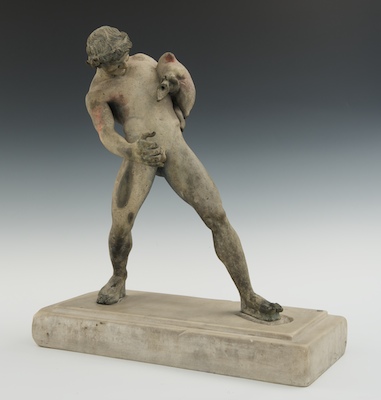 An Archiastic Statuette of a Satyr Pouring