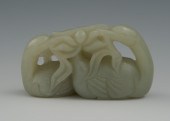 A Chinese Carved Jade Grouping of Two