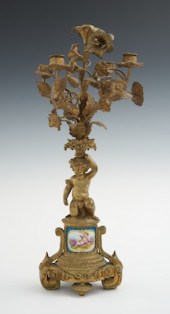 An Ormolu Figural Candleabrum Standing