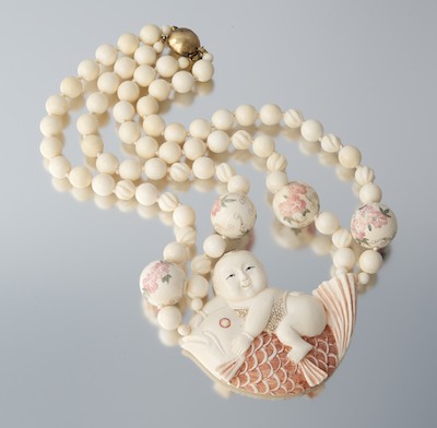 A Carved Ivory Necklace with Boy 132b21