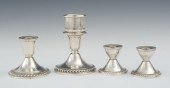 Four Sterling Silver Candlesticks 132b97