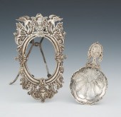 A Silver Repousse Picture Frame and