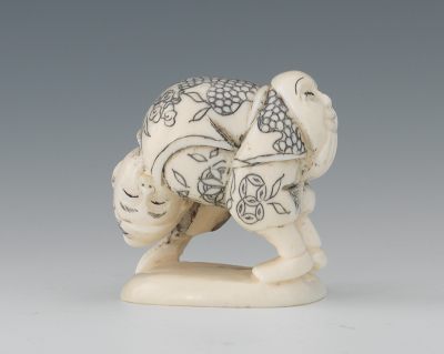 A Whimsical Carved Ivory Netsuke 13365b