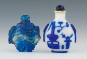 Two Chinese Snuff Bottles Containing: