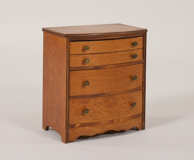 A Wooden Doll s Chest of Drawers 133788