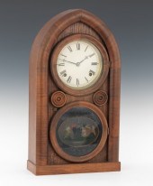 An Ingraham Shelf Clock Venered wood
