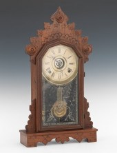 A Victorian Walnut Alarm Mantel Clock
