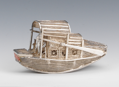 A Chinese Silver Miniature River Boat With