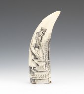 A Scrimshaw Tooth With a portrait of