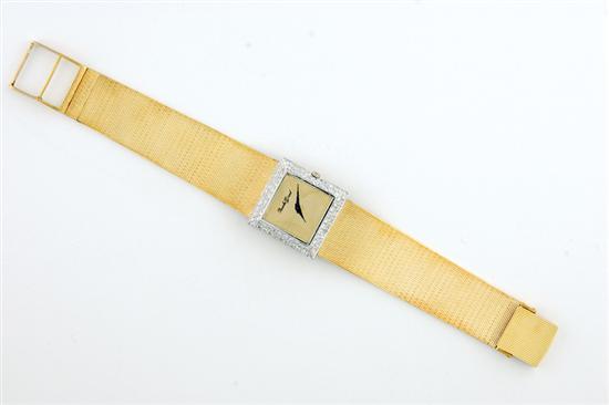 Diamond-set gold man's wristwatch by Bueche
