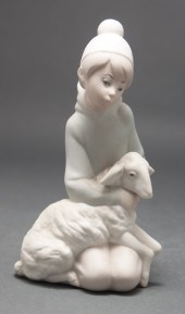 Lladro painted bisque figure of a young