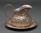 American repousse sterling silver creamer