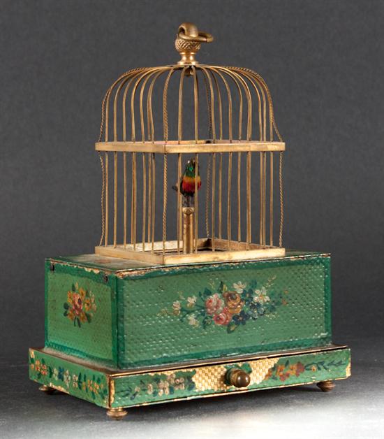 Painted gilt metal bird in cage 135efd