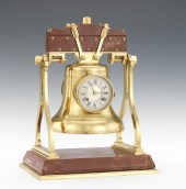 A Brass Clock in the Form of a Bell