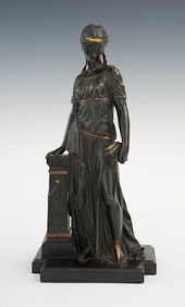 A Painted and Gilt Bronze Figure of