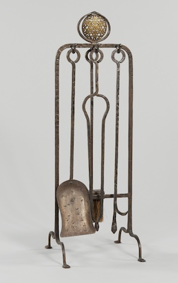 An Arts and Crafts Wrought Iron Fireplace