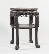 A Medium Carved Wood and Marble Table
